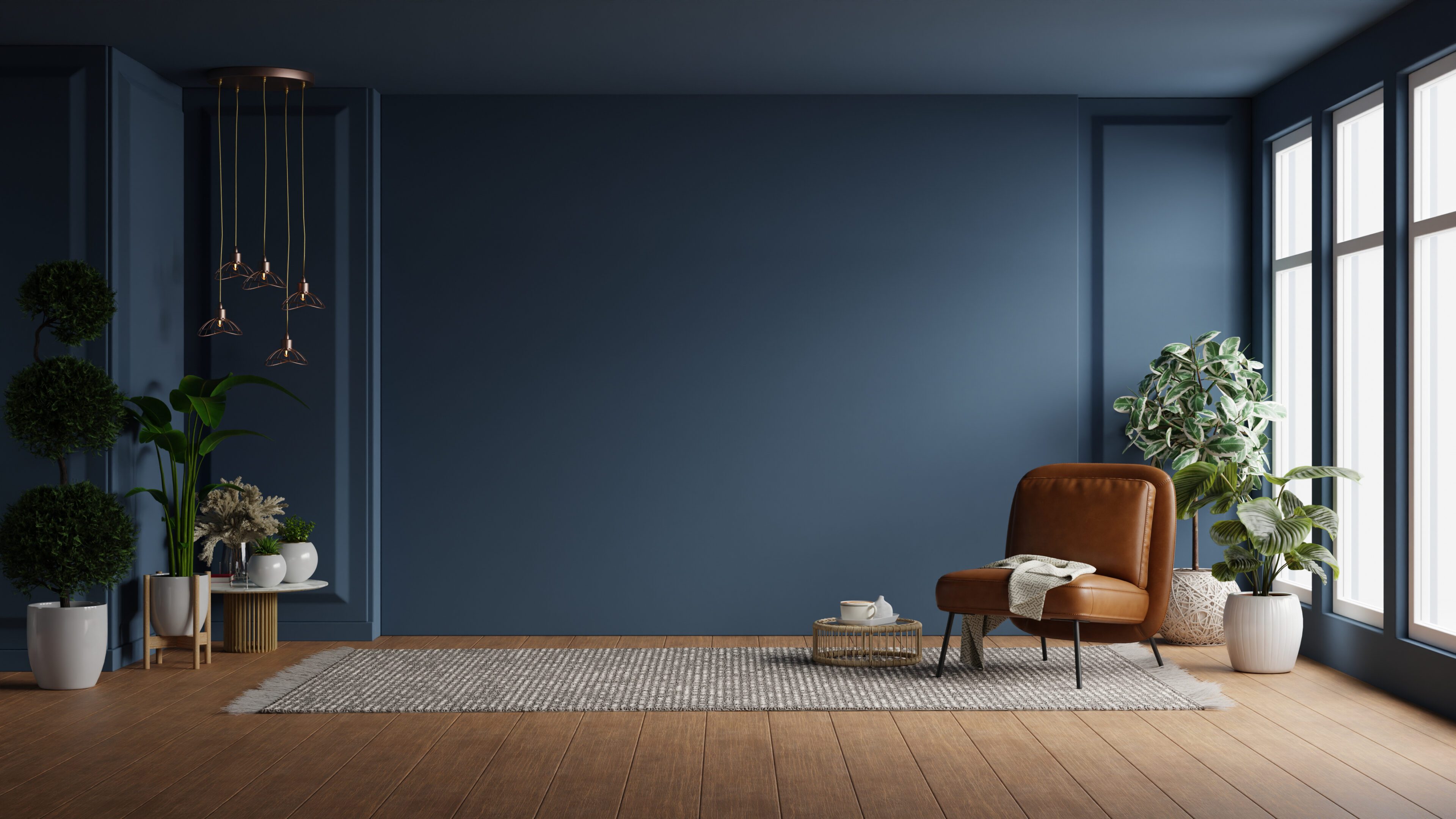 Modern interior of living room with leather armchair on wood flooring and dark blue wall Modern interior of living room with leather armchair on wood flooring and dark blue wall- 3D rendering